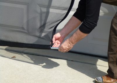 Garage door screen pouch